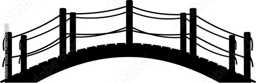 Arched footbridge silhouette with rope handrails