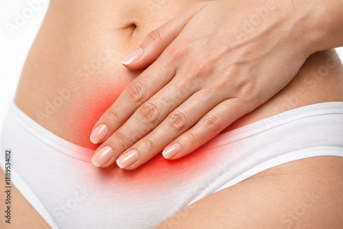 Wallpaper Mural Woman belly pelvic pain uterine fibroids myoma endometrial polyp gynecology female health abdomen Woman belly with hand over pelvic pain showing uterine fibroids myoma endometrial polyp concern Torontodigital.ca