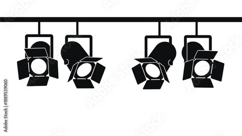 A row of stage lights hanging from a metal rail on a white background