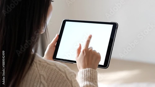 Woman Holding Tablet with Blank Screen.