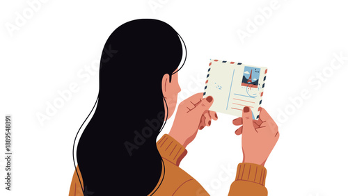 A woman holding a postcard in her hands with a thoughtful expression