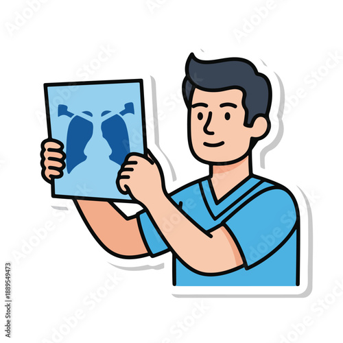 A man in blue scrubs examining an X-ray