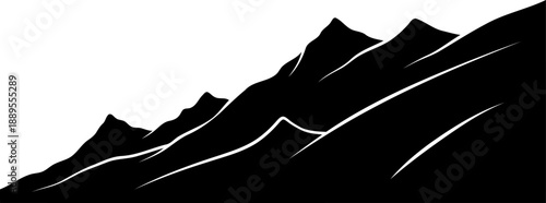 Jagged mountain peaks silhouette against clear sky