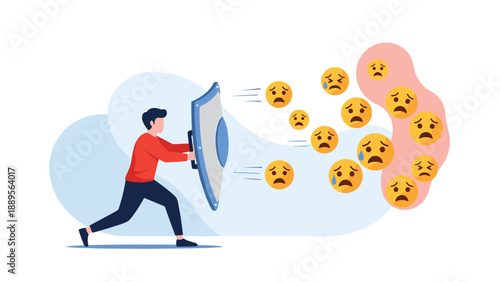 Determined man holding a large blue shield to protect himself against a swarm of flying sad and crying face emojis.