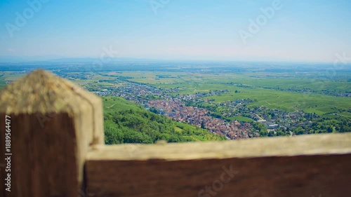 Mountain viewpoint overlooking village and vineyards below near Ribeauville, France