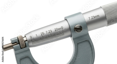 Close-up of a silver metal micrometer showing a 7.23mm measurement