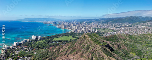 Aerial panorama of Honolulu Waikiki Beach from distance, Diamond Head Mountain famous lookout point in the foreground
