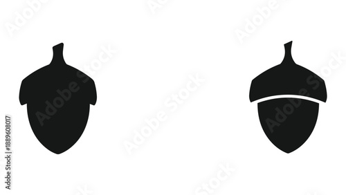 Simple black silhouette of acorn icon set