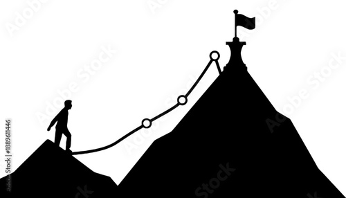 A silhouette of a man climbing a mountain to reach a flag