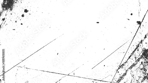 Black ink splatters and scratches on a white textured background stain