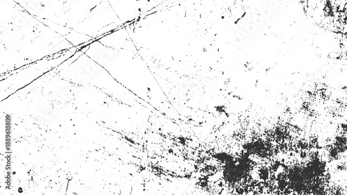 Black ink splatters and scratches on a white textured background abstract