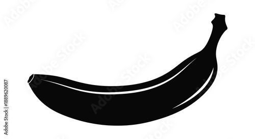 A striking black silhouette depicts a curved banana against a stark white background highlighting its simple form silhouette high quality professional