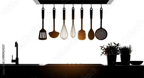 Kitchen Utensils Hanging Above Countertop With Sink and Plants.