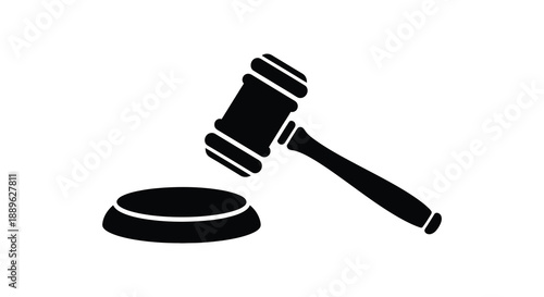 A stark black silhouette of a gavel and sounding block represents legal proceedings and justice a powerful silhouette high quality professional