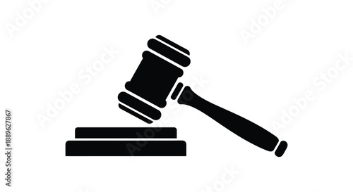 A stark black silhouette depicts a gavel resting on a sound block symbolizing law justice and legal proceedings silhouette high quality