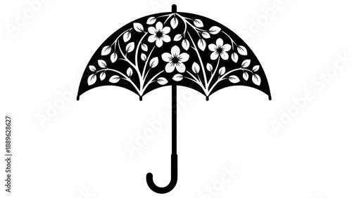 A black umbrella with white floral design on a plain background