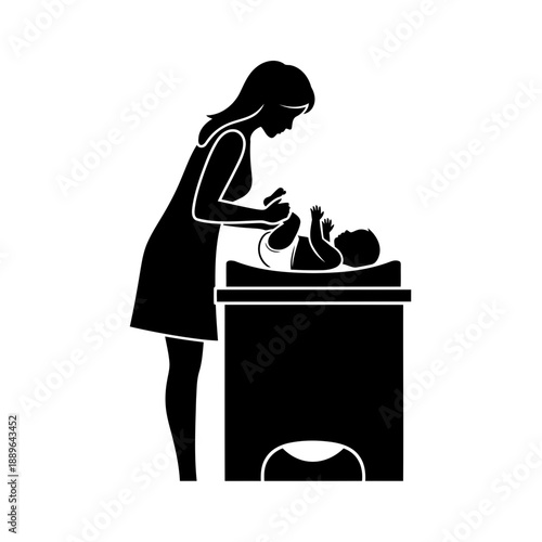 Mother feeding baby with bottle silhouette