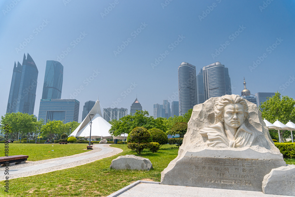 Fototapeta premium Beethoven monument an the park along the promenade in Qingdao, China