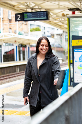 Maori woman on a suburban train platform in Auckland