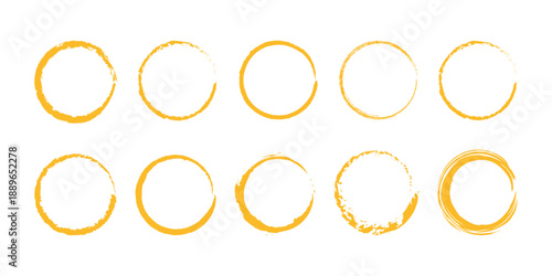 Set of ten hand-drawn yellow circular grunge frames for design elements