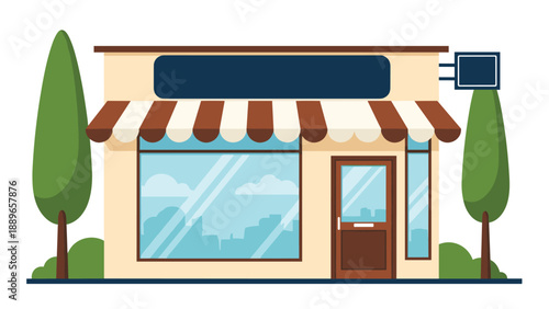 Modern storefront building with a brown and white striped awning large glass display windows and a wooden door framed by green trees.