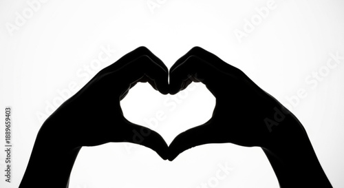 Hands forming a heart shape symbolizing love and affection in a simple gesture