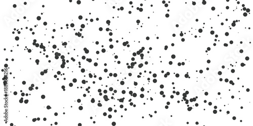 An abstract black and white grunge background featuring a vector ink splash pattern with liquid paint splatter stains and dirty texture elements for an artistic wallpaper design
