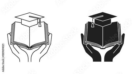 Hands holding book with graduation cap