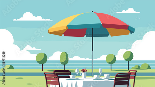 Colorful beach umbrella shades an outdoor dining table set for tea with a beautiful ocean view and green trees in the background.