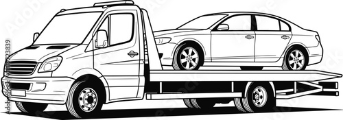 Tow truck carrying a car on platform