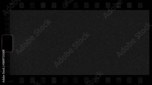 Evoke timeless nostalgia with this vintage film strip frame overlay, showcasing a dark, grainy texture, perfect for an authentic retro cinematic effect in digital projects
