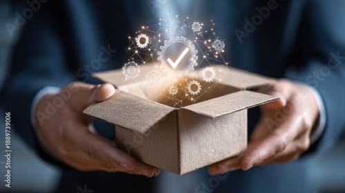 Unveiling Success: A hand holds open a cardboard box, with a glowing check mark and technical elements emerging, symbolizing the delivery of a successful project.