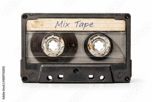 Professional studio photo vintage audio cassette front view worn plastic scratched window and faded label isolated on white background