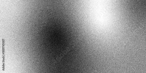 Brushed metal plate background featuring a dark gray stainless steel surface with a shiny silver aluminum texture and metallic chrome pattern for a textured light material backdrop