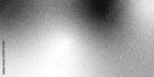 Abstract brushed metal texture background displays a shiny silver stainless steel surface with a dark grey metallic pattern for a modern aluminum plate wallpaper design