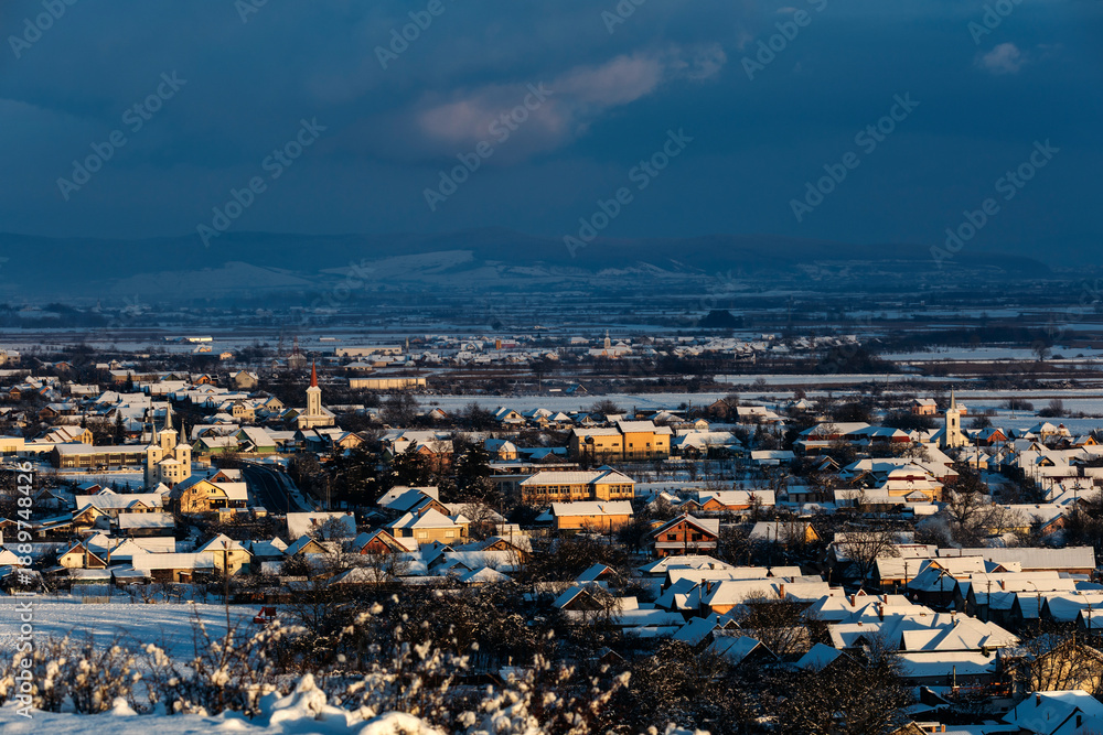 Obraz premium Snowy village aerial view