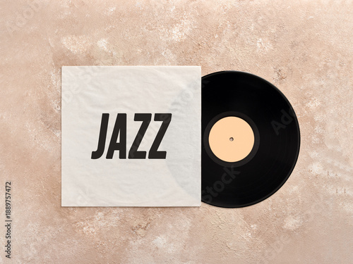 Photography Vinyl record with its cover resting on a textured surface, playing jazz music