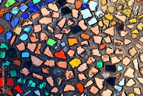 Background, texture mosaic made of smalt, opal glass, bright multi-colored pieces of smalt of various shapes