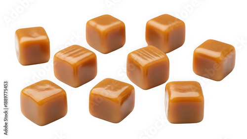 Collection of nine scattered soft square caramel toffee candy cubes isolated on transparent background