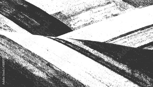 Abstract textured monochrome background with diagonal dark gray and white stripes and speckles black