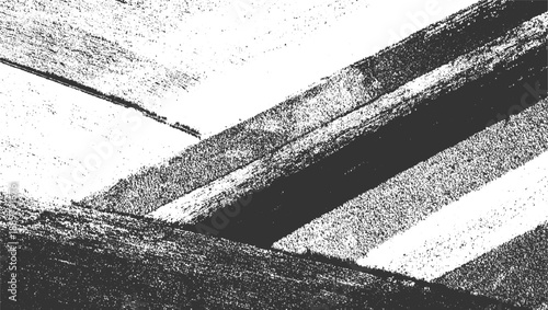 Abstract textured black and white diagonal stripes with grainy overlay pattern