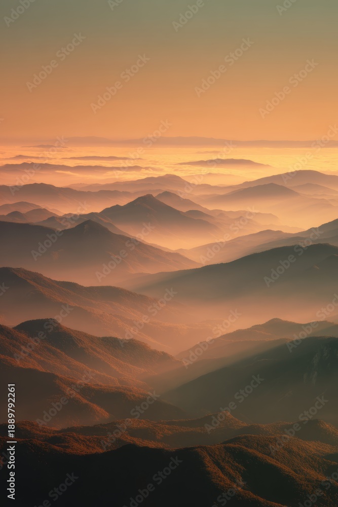 custom made wallpaper toronto digitalSurreal mountain landscape at sunrise, layered mist in the valleys, warm golden light touching the peaks, tranquil and timeless feeling, minimal composition, fine art landscape