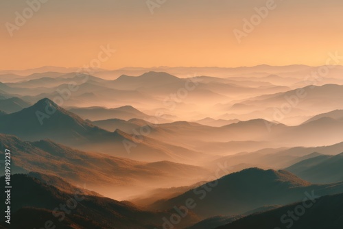 Wallpaper Mural Surreal mountain landscape at sunrise, layered mist in the valleys, warm golden light touching the peaks, tranquil and timeless feeling, minimal composition, fine art landscape  Torontodigital.ca