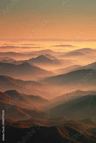 Wallpaper Mural Surreal mountain landscape at sunrise, layered mist in the valleys, warm golden light touching the peaks, tranquil and timeless feeling, minimal composition, fine art landscape  Torontodigital.ca