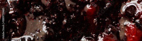 Fotografie Raspberry jam as an abstract background. Close-up