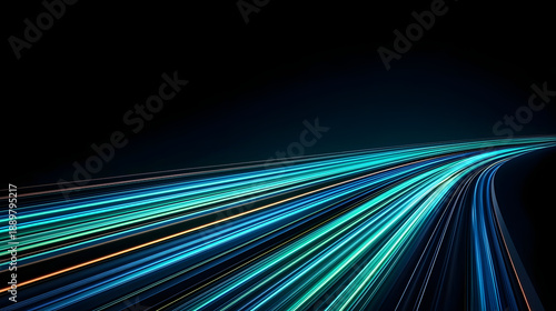 Vibrant light trails create dynamic sense of motion and energy in dark background
