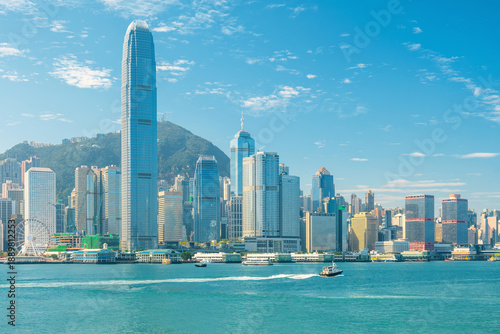Photography View of Hong Kong city skyline along Victoria Harbour with skyscrapers, modern office towers and buildings, China