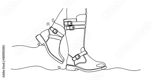Continuous line drawing of stylish leather boots with buckles. Non editable stroke