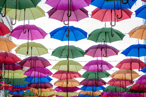 Colorful Umbrella Street Installation in Timisoara, Romania. Colorful umbrella street installation in Timisoara, Romania, creating a vibrant urban scene with hanging umbrellas, pedestrian street.