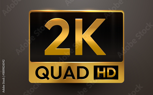 A sleek golden metallic 2K QUAD HD sign on a dark background, symbolizing high definition video standards.